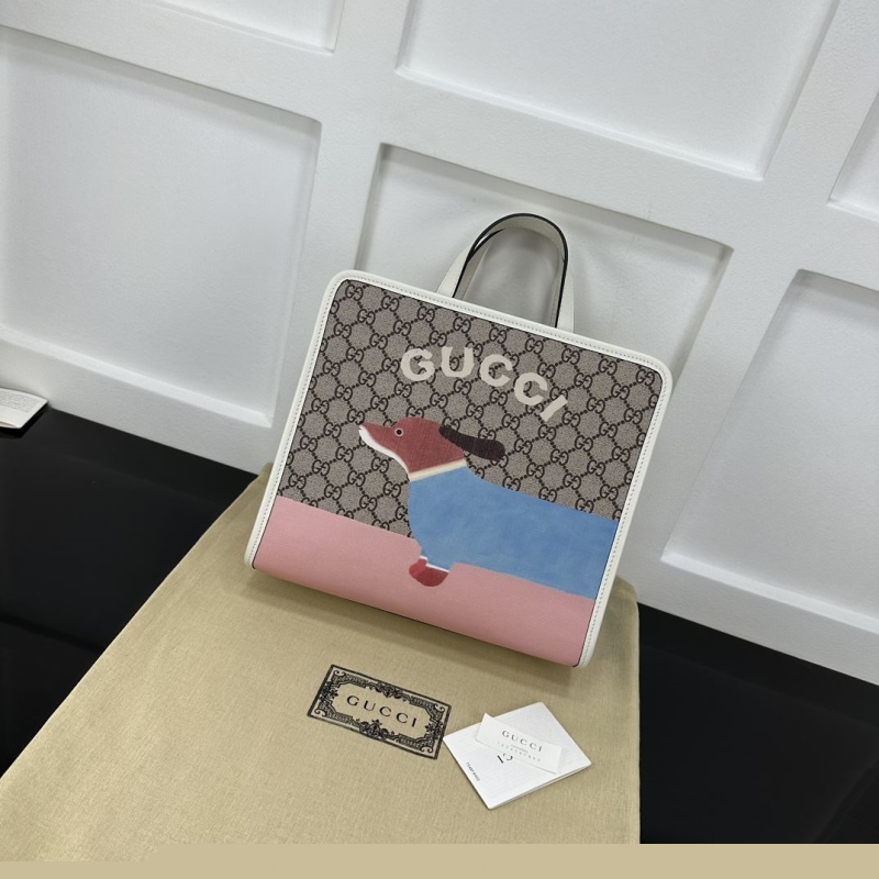 G*u*i shopping bags